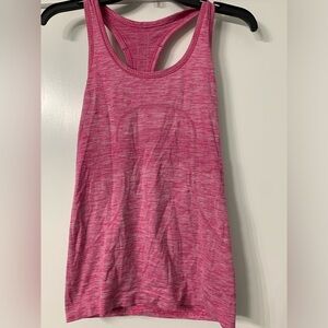 Pink lululemon form fitting pink work out top